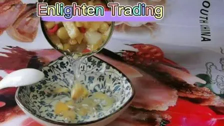 Cóctel de frutas enlatadas mixtas de piña, cereza, uva y pera en almíbar ligero